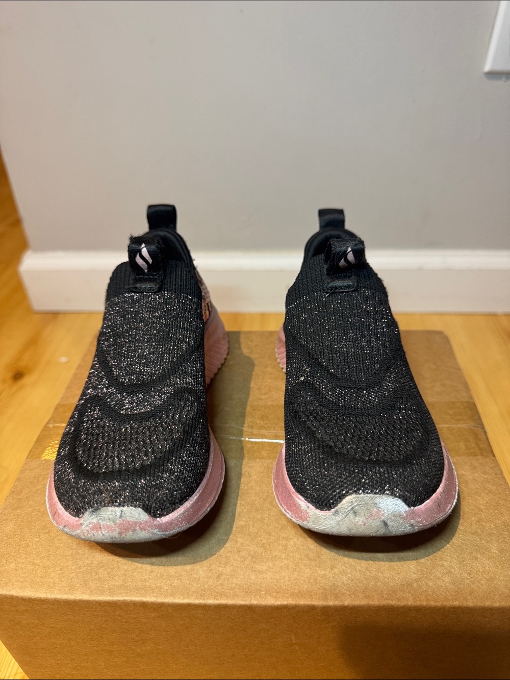 Skechers Kids Black Knit Slip-On Sneakers with Pink Soles